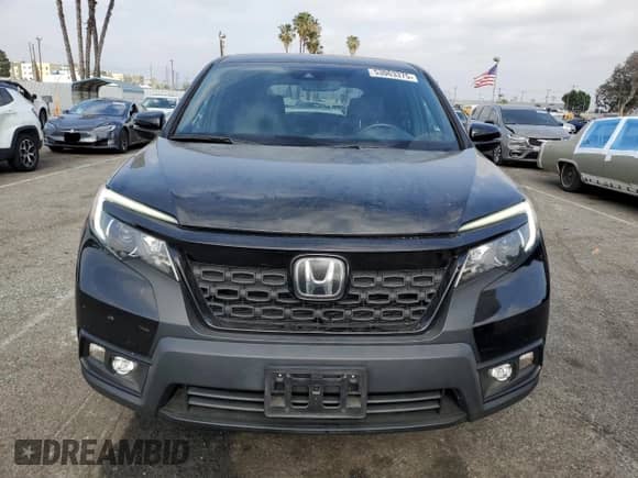 2020 Honda Passport EX-L with VIN 5FNYF7H57LB002571, listed as a Copart auction lot 53063375 with 56,866 mi miles and Salvage title. Bid and sale history available at DreamBid. Image 5.