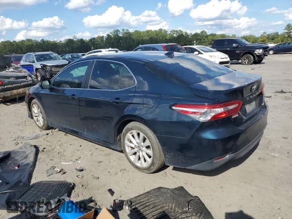 2019 Toyota Camry LE с VIN 4T1B11HK6KU842124, выставлен на аукционе Copart как лот 83793575 с пробегом 194 095 миль миль и Списание • Salvage title. История ставок и продаж доступна на DreamBid. Изображение 2.