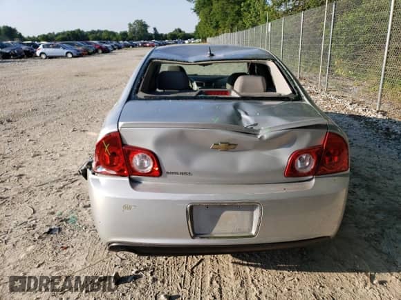 2010 Chevrolet Malibu 1LS с VIN 1G1ZB5EB8AF147652, выставлен на аукционе Copart как лот 63212805 с пробегом 141 839 миль миль и Списание • Salvage title. История ставок и продаж доступна на DreamBid. Изображение 6.