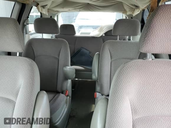 2007 Dodge Caravan SXT with VIN 1D4GP45R57B161051, listed as a Copart auction lot 58259765 with 105,658 mi miles and Salvage title. Bid and sale history available at DreamBid. Image 10.