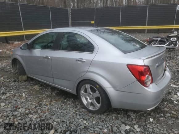 2014 Chevrolet Sonic LTZ with VIN 1G1JE5SB4E4201684, listed as a Copart auction lot 43089345 with 161,948 mi miles and Salvage title. Bid and sale history available at DreamBid. Image 2.