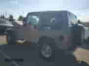 1999 Jeep Wrangler Sport with VIN 1J4FY19S9XP417531, listed as a Copart auction lot 86538315 with 161,004 mi miles and Salvage title. Bid and sale history available at DreamBid. Image 2.