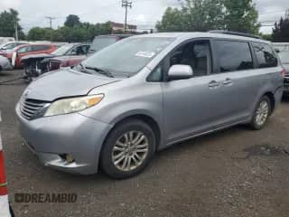 2012 Toyota Sienna XLE AAS with VIN 5TDYK3DC1CS273369, listed as a Copart auction lot 62348025 with Not provided miles and Clean title. Bid and sale history available at DreamBid. Image 1.