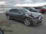 2011 Dodge Charger RT Max z VIN 2B3CM5CTXBH610699, wystawiony jako Copart lot #79752424 z przebiegiem 153 630 mil mil oraz Szkoda całkowita • Salvage title. Historia ofert i sprzedaży dostępna na DreamBid. Obrazek 4.