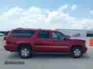 2010 Chevrolet Suburban LT z VIN 1GNUCJE03AR267838, wystawiony jako IAAI lot #42535623 z przebiegiem 265 769 mil mil oraz . Historia ofert i sprzedaży dostępna na DreamBid. Obrazek 13.