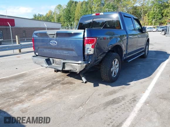 2018 Ford F-150 XL z VIN 1FTEW1EB1JFA00995, wystawiony jako IAAI lot #43190468 z przebiegiem 103 881 mil mil oraz . Historia ofert i sprzedaży dostępna na DreamBid. Obrazek 4.