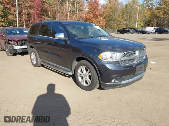 2012 Dodge Durango Crew with VIN 1C4SDJDT2CC358890, listed as a IAAI auction lot 43527106 with 161,168 mi miles and . Bid and sale history available at DreamBid. Image 1.