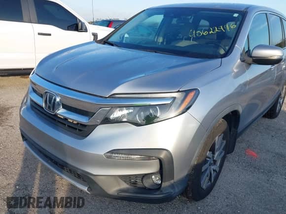 2020 Honda Pilot EX z VIN 5FNYF5H37LB021513, wystawiony jako IAAI lot #40622946 z przebiegiem Nie podano mil oraz . Historia ofert i sprzedaży dostępna na DreamBid. Obrazek 6.