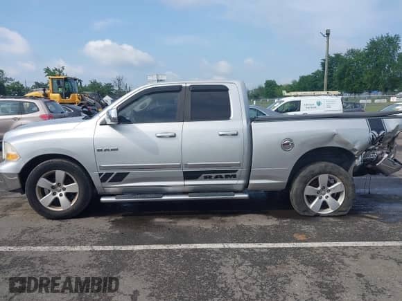 2009 Dodge 1500 SLT with VIN 1D3HB18P09S767716, listed as a IAAI auction lot 42601499 with 195,543 mi miles and . Bid and sale history available at DreamBid. Image 14.