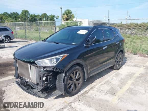 2017 Hyundai Santa Fe Ultimate with VIN 5XYZW4LA2HG490108, listed as a IAAI auction lot 42703796 with 61,041 mi miles and . Bid and sale history available at DreamBid. Image 2.