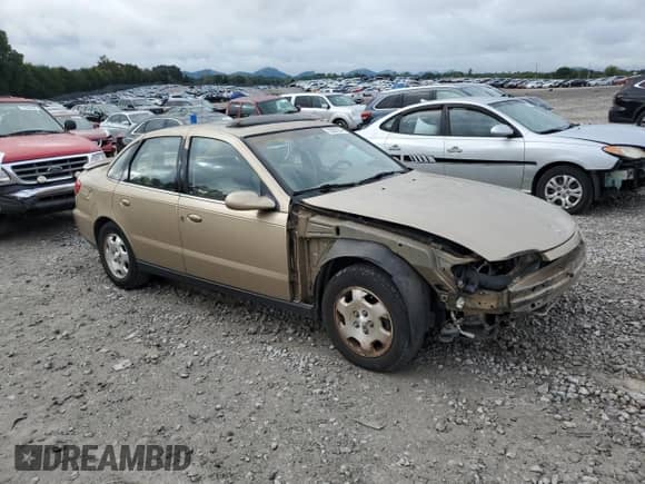 2001 Saturn LS with VIN 1G8JW52R51Y523667, listed as a Copart auction lot 72062224 with 123,345 mi miles and Salvage title. Bid and sale history available at DreamBid. Image 4.