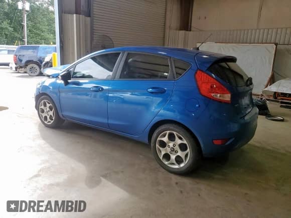 2011 Ford Fiesta SES with VIN 3FADP4FJ7BM129640, listed as a Copart auction lot 64300315 with 69,431 mi miles and Salvage title. Bid and sale history available at DreamBid. Image 2.