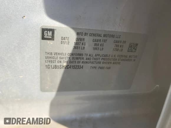 2012 Chevrolet Sonic LS z VIN 1G1JB5SH2C4152334, wystawiony jako Copart lot #46574475 z przebiegiem 145 396 mil mil oraz Szkoda całkowita • Salvage title. Historia ofert i sprzedaży dostępna na DreamBid. Obrazek 14.