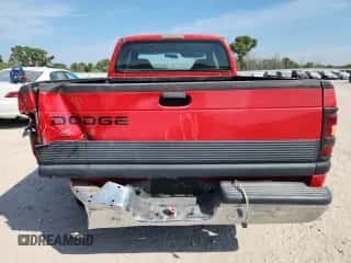 2001 Dodge 1500 z VIN 1B7HC13Y21J290075, wystawiony jako Copart lot #72085035 z przebiegiem Nie podano mil oraz Szkoda całkowita • Salvage title. Historia ofert i sprzedaży dostępna na DreamBid. Obrazek 6.