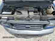 2003 Ford Econoline Cargo z VIN 1FTNE24223HA52007, wystawiony jako Copart lot #56955795 z przebiegiem 251 774 mil mil oraz Szkoda całkowita • Salvage title. Historia ofert i sprzedaży dostępna na DreamBid. Obrazek 12.