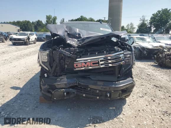 2023 GMC Sierra 1500 Denali z VIN 3GTUUGED7PG111838, wystawiony jako Copart lot #63683155 z przebiegiem Nie podano mil oraz Czysty tytuł • Clean title. Historia ofert i sprzedaży dostępna na DreamBid. Obrazek 5.