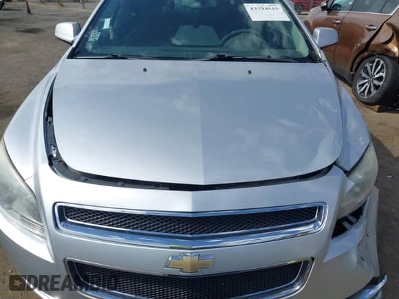 2012 Chevrolet Malibu 1LT z VIN 1G1ZC5E09CF301185, wystawiony jako IAAI lot #43294515 z przebiegiem 136 962 mil mil oraz . Historia ofert i sprzedaży dostępna na DreamBid. Obrazek 15.