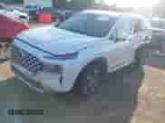 2021 Hyundai Santa Fe SEL z VIN 5NMS24AJ6MH318230, wystawiony jako IAAI lot #43106688 z przebiegiem 63 291 mil mil oraz . Historia ofert i sprzedaży dostępna na DreamBid. Obrazek 17.