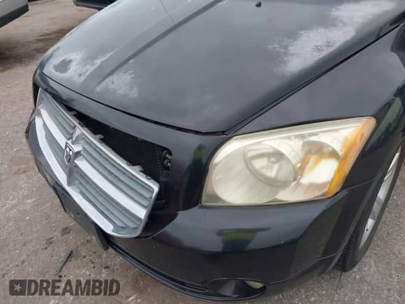 2010 Dodge Caliber Mainstreet with VIN 1B3CB3HA5AD566737, listed as a IAAI auction lot 42776203 with 108,857 mi miles and . Bid and sale history available at DreamBid. Image 6.