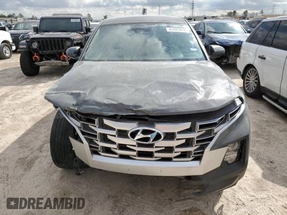 2023 Hyundai Santa Cruz SEL z VIN 5NTJB4AE5PH040718, wystawiony jako Copart lot #41083834 z przebiegiem 14 809 mil mil oraz Szkoda całkowita • Salvage title. Historia ofert i sprzedaży dostępna na DreamBid. Obrazek 5.