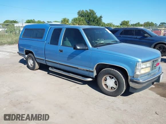 1996 GMC Sierra 1500 z VIN 2GTEC19M9T1527701, wystawiony jako IAAI lot #43289683 z przebiegiem 297 195 mil mil oraz . Historia ofert i sprzedaży dostępna na DreamBid. Obrazek 1.
