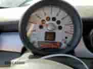 2011 MINI Hardtop with VIN WMWSU3C52BT253034, listed as a Copart auction lot 90109305 with 50,636 mi miles and Salvage title. Bid and sale history available at DreamBid. Image 9.