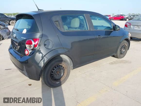 2014 Chevrolet Sonic LS with VIN 1G1JA6SHXE4173119, listed as a IAAI auction lot 42695969 with 118,774 mi miles and . Bid and sale history available at DreamBid. Image 4.