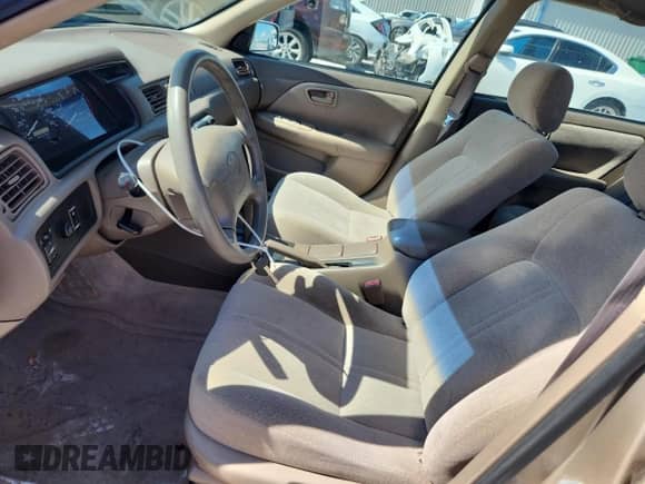 2000 Toyota Camry LE z VIN JT2BG22K7Y0467127, wystawiony jako Copart lot #84280225 z przebiegiem 118 606 mil mil oraz Szkoda całkowita • Salvage title. Historia ofert i sprzedaży dostępna na DreamBid. Obrazek 7.