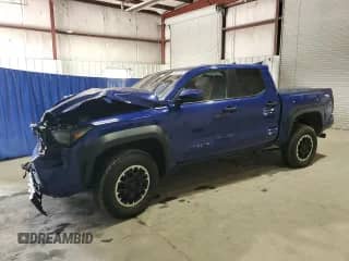 2024 Toyota Tacoma TRD Off Road with VIN 3TMLB5JN6RM026286, listed as a Copart auction lot 81666825 with 27,497 mi miles and Salvage title. Bid and sale history available at DreamBid. Image 1.