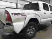 2014 Toyota Tacoma with VIN 3TMLU4EN8EM148737, listed as a IAAI auction lot 43256920 with 106,235 mi miles and . Bid and sale history available at DreamBid. Image 6.