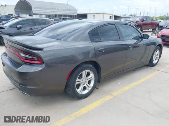 2019 Dodge Charger SXT with VIN 2C3CDXBG7KH707734, listed as a IAAI auction lot 42659110 with 68,600 mi miles and . Bid and sale history available at DreamBid. Image 4.