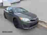 2012 Toyota Camry SE with VIN 4T1BF1FK8CU585490, listed as a Copart auction lot 87177495 with 201,503 mi miles and Clean title. Bid and sale history available at DreamBid. Image 1.