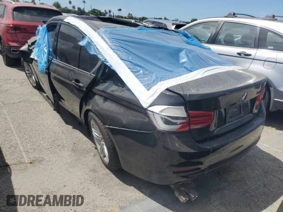 2017 BMW 3 Series 330i with VIN WBA8B9C52HK675855, listed as a Copart auction lot 80554455 with Not provided miles and Salvage title. Bid and sale history available at DreamBid. Image 2.