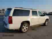 2009 Chevrolet Suburban 1LT z VIN 1GNFC26J09R147755, wystawiony jako Copart lot #72418304 z przebiegiem 239 660 mil mil oraz Szkoda całkowita • Salvage title. Historia ofert i sprzedaży dostępna na DreamBid. Obrazek 3.