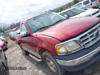 1999 Ford F-150 z VIN 1FTRF17W0XNB51584, wystawiony jako IAAI lot #41872666 z przebiegiem 157 848 mil mil oraz . Historia ofert i sprzedaży dostępna na DreamBid. Obrazek 1.