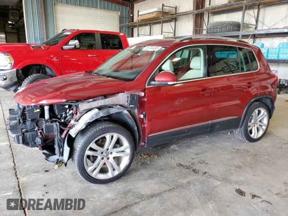 2013 Volkswagen Tiguan SE с VIN WVGAV7AXXDW041017, выставлен на аукционе Copart как лот 58734495 с пробегом 76 974 миль миль и Списание • Salvage title. История ставок и продаж доступна на DreamBid. Изображение 1.