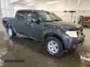 2012 Nissan Frontier SL with VIN 1N6AD0EV3CC437617, listed as a Copart auction lot 63193585 with 151,496 mi miles and Salvage title. Bid and sale history available at DreamBid. Image 4.
