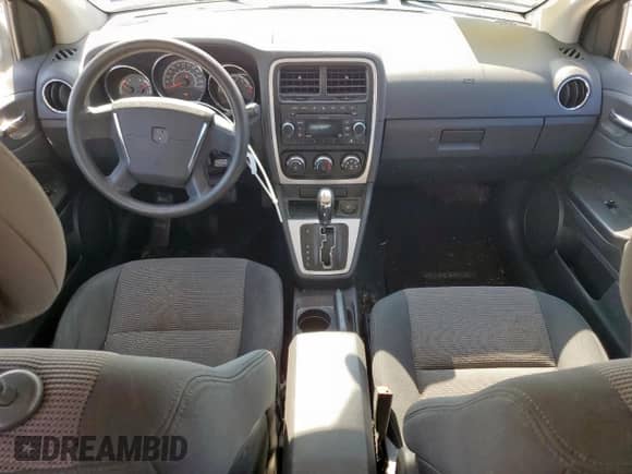 2010 Dodge Caliber SXT with VIN 1B3CB4HA2AD533460, listed as a Copart auction lot 71959205 with 159,235 mi miles and Salvage title. Bid and sale history available at DreamBid. Image 8.