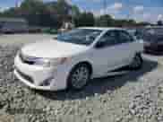 2014 Toyota Camry LE with VIN 4T1BD1FK2EU097533, listed as a Copart auction lot 71321915 with 127,214 mi miles and Salvage title. Bid and sale history available at DreamBid. Image 1.