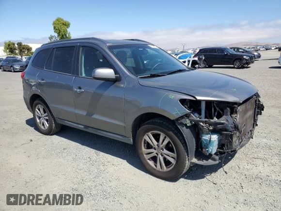 2012 Hyundai Santa Fe Limited с VIN 5XYZK4AG8CG121507, выставлен на аукционе Copart как лот 60139095 с пробегом 101 711 миль миль и Списание • Salvage title. История ставок и продаж доступна на DreamBid. Изображение 4.