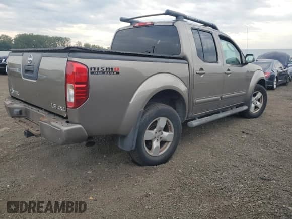 2005 Nissan Frontier LE с VIN 1N6AD07W15C435387, выставлен на аукционе Copart как лот 82041215 с пробегом 191 231 миль миль и Списание • Salvage title. История ставок и продаж доступна на DreamBid. Изображение 3.