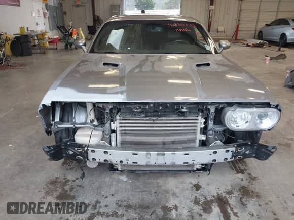 2014 Dodge Challenger R/T с VIN 2C3CDYBT5EH299046, выставлен на аукционе IAAI как лот 41330322 с пробегом 131 738 миль миль и . История ставок и продаж доступна на DreamBid. Изображение 13.