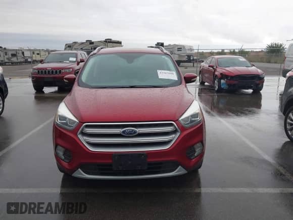 2017 Ford Escape Titanium z VIN 1FMCU9J97HUA95899, wystawiony jako IAAI lot #43365600 z przebiegiem 95 376 mil mil oraz . Historia ofert i sprzedaży dostępna na DreamBid. Obrazek 12.