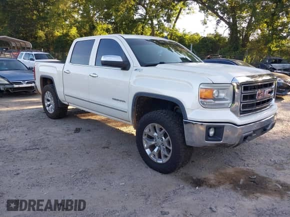 2014 GMC Sierra 1500 SLT z VIN 3GTU2VEC7EG336016, wystawiony jako IAAI lot #42830434 z przebiegiem 143 267 mil mil oraz . Historia ofert i sprzedaży dostępna na DreamBid. Obrazek 1.