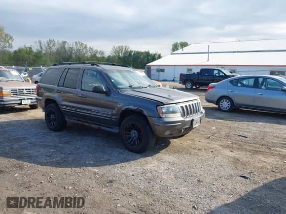 2002 Jeep Grand Cherokee Overland with VIN 1J8GW68J92C172096, listed as a IAAI auction lot 43437807 with 201,882 mi miles and . Bid and sale history available at DreamBid. Image 1.