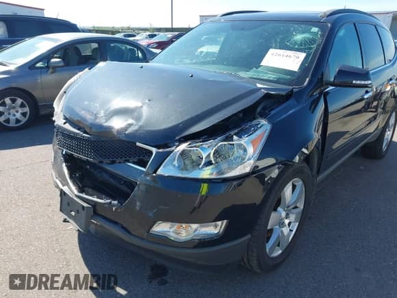 2012 Chevrolet Traverse 1LT with VIN 1GNKVGED0CJ147603, listed as a IAAI auction lot 42614679 with 83,148 mi miles and . Bid and sale history available at DreamBid. Image 6.