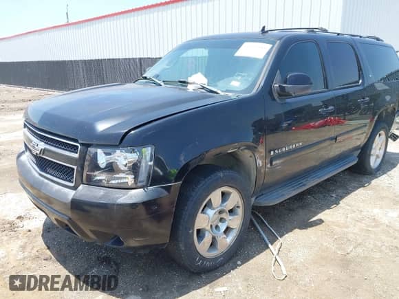 2007 Chevrolet Suburban LT z VIN 1GNFK16317R179979, wystawiony jako IAAI lot #42435485 z przebiegiem 145 505 mil mil oraz . Historia ofert i sprzedaży dostępna na DreamBid. Obrazek 2.