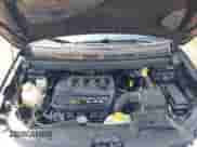 2013 Dodge Journey American Value z VIN 3C4PDCAB1DT665342, wystawiony jako IAAI lot #43204169 z przebiegiem 165 036 mil mil oraz . Historia ofert i sprzedaży dostępna na DreamBid. Obrazek 10.