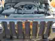 2021 Jeep Wrangler Unlimited Sahara High Altitude with VIN 1C4HJXEG7MW537997, listed as a Copart auction lot 74322054 with 60,226 mi miles and Salvage title. Bid and sale history available at DreamBid. Image 12.