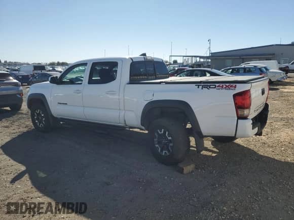 2016 Toyota Tacoma SR5 z VIN 3TMDZ5BN6GM007815, wystawiony jako Copart lot #85360485 z przebiegiem 148 477 mil mil oraz Szkoda całkowita • Salvage title. Historia ofert i sprzedaży dostępna na DreamBid. Obrazek 2.